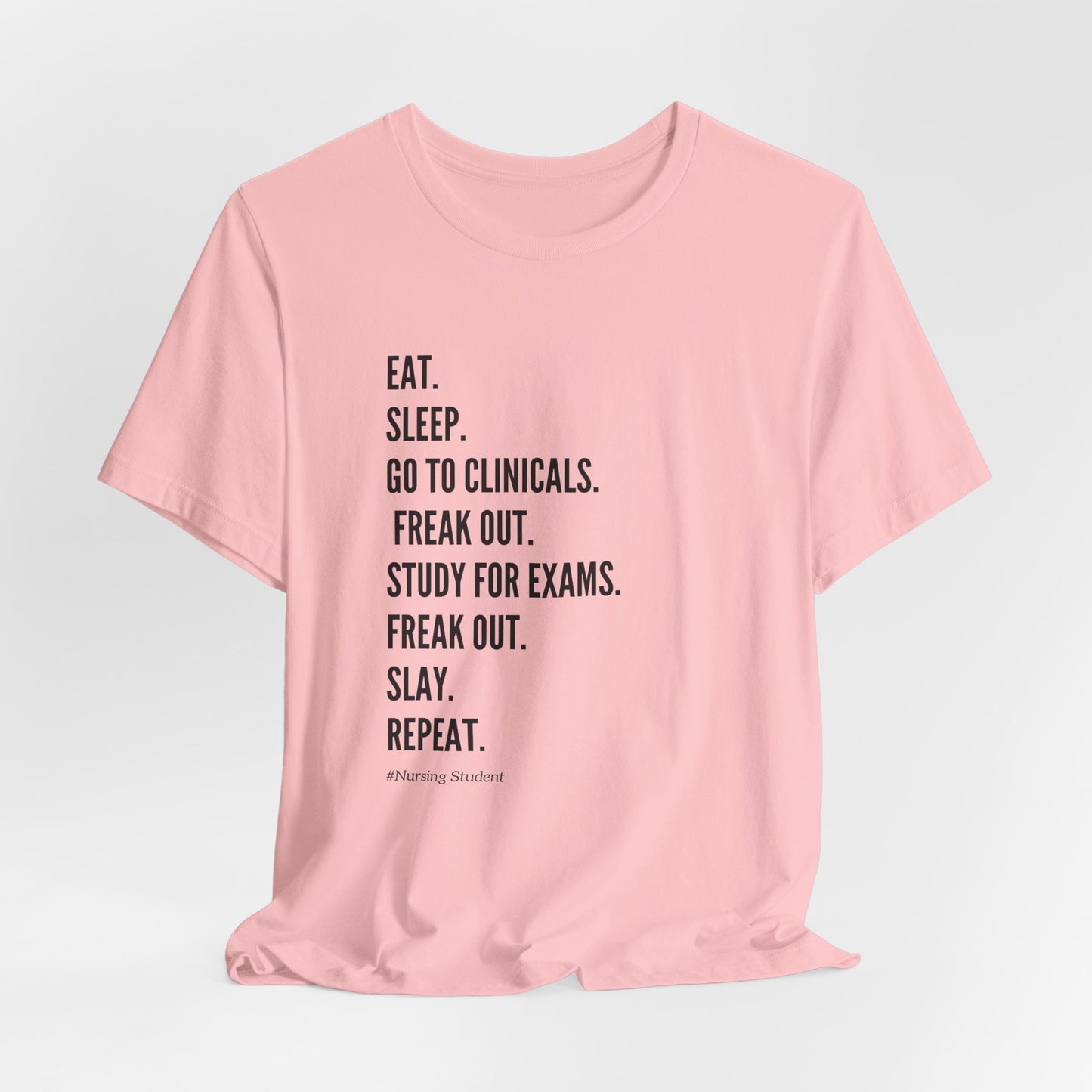 Nursing Student Tee — “Eat. Sleep. Go to Clinicals. Freak Out. Study for Exams. Freak Out. Slay. Repeat.”