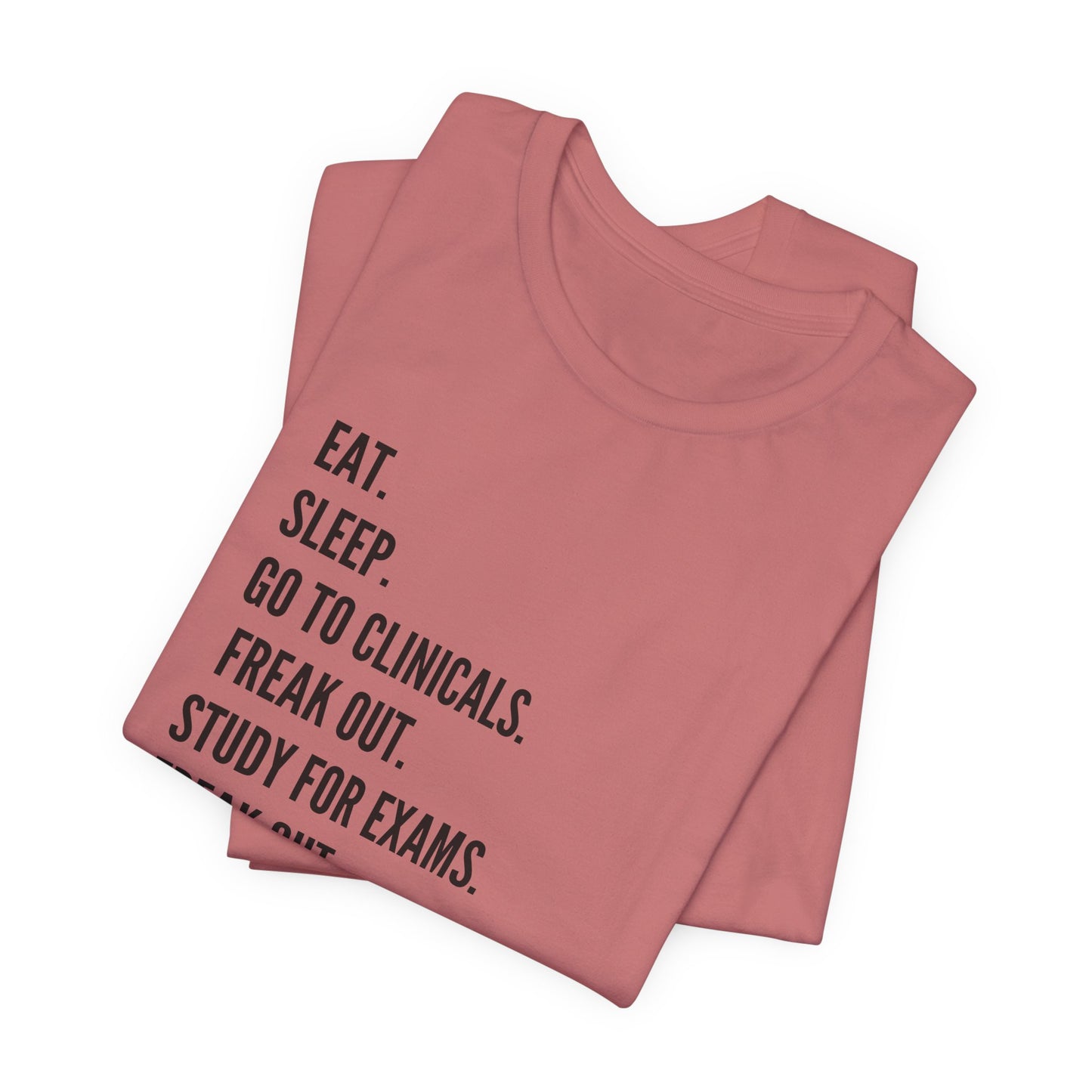 Nursing Student Tee — “Eat. Sleep. Go to Clinicals. Freak Out. Study for Exams. Freak Out. Slay. Repeat.”