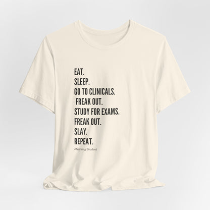 Nursing Student Tee — “Eat. Sleep. Go to Clinicals. Freak Out. Study for Exams. Freak Out. Slay. Repeat.”