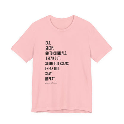 Nursing Student Tee — “Eat. Sleep. Go to Clinicals. Freak Out. Study for Exams. Freak Out. Slay. Repeat.”