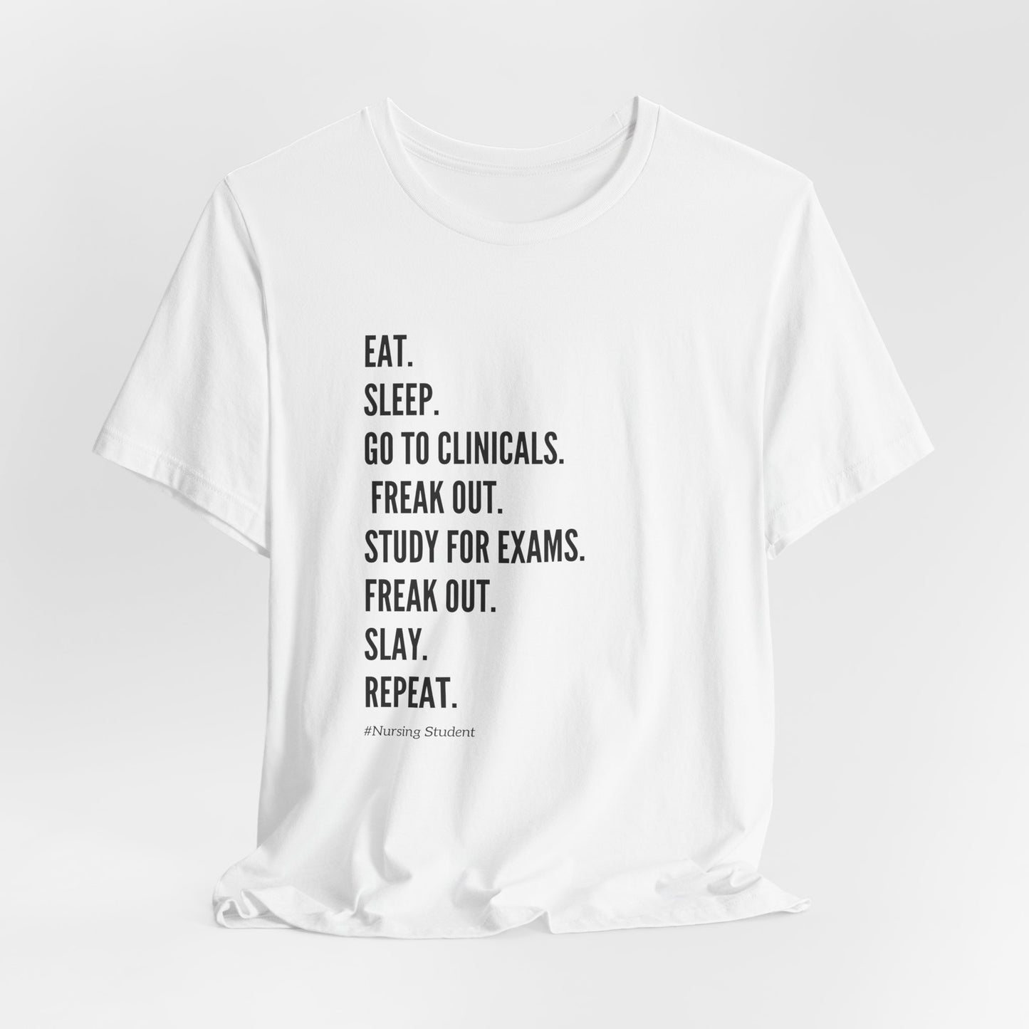 Nursing Student Tee — “Eat. Sleep. Go to Clinicals. Freak Out. Study for Exams. Freak Out. Slay. Repeat.”